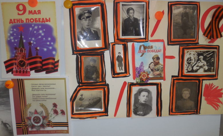 Стенгазета и портреты солдат на стене